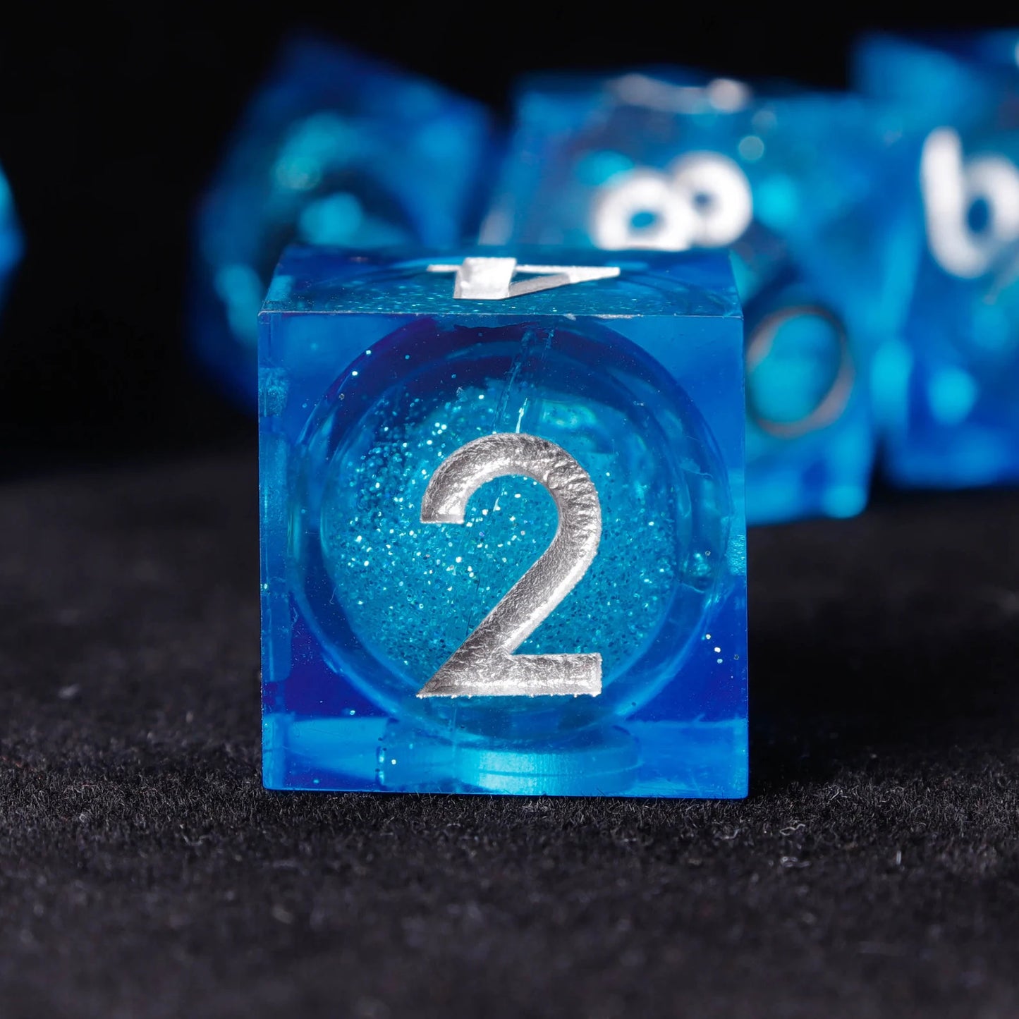 etailed view of glittering swirl inside Blue Starry Liquid Core D&D Dice