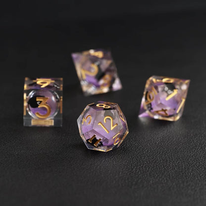 Detailed view of purple resin Liquid Core Dice with black cat animal core suspended inside transparent liquid
