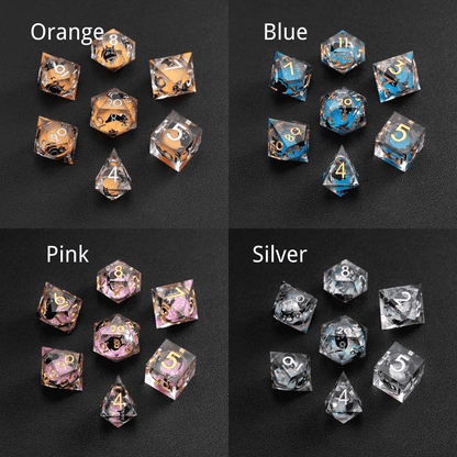 Liquid Core Dice resin set animal series showing orange, purple, pink, and silver swirl designs in one collection display