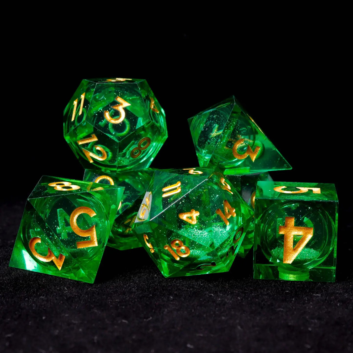 Close-up of a liquid core die in motion, revealing a dynamic green starry aesthetic.