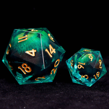 Oversized Demon Eye D20 side-by-side with standard D20, showing size comparison and glowing demon eye core