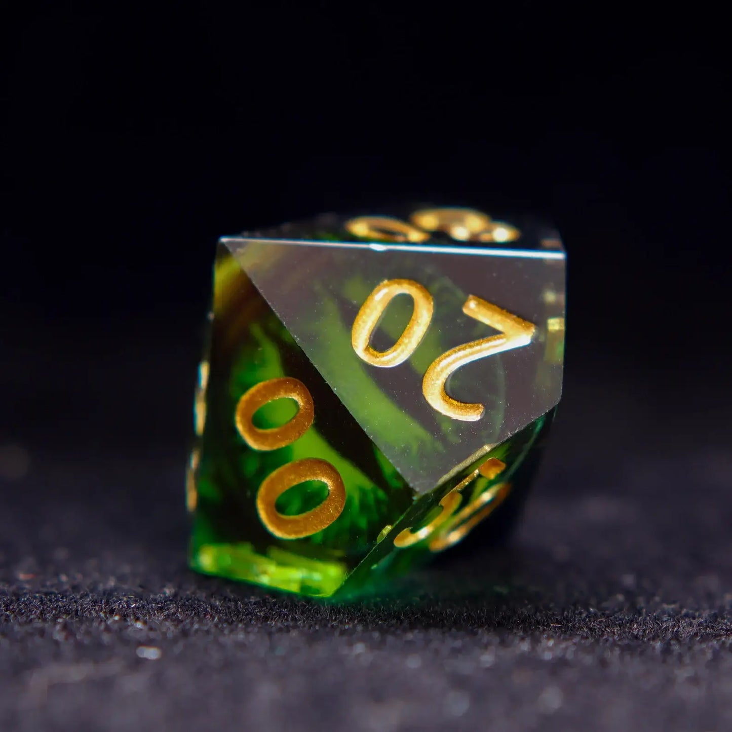 Green Resin percentile D10 dice (00-90 and 0-9) from the Demon's Eye set.