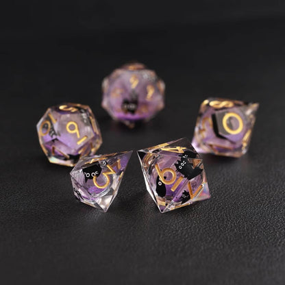 Angled display of purple swirl liquid core resin animal dice highlighting depth, clarity, and floating black cat core