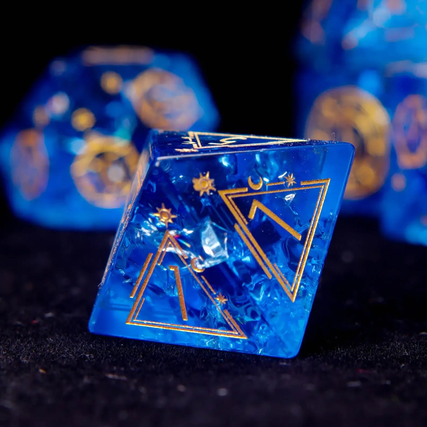 The eight-sided D8 glass dice. Each triangular face and sharp edge is perfectly formed, creating a stunning geometric crystal dice.
