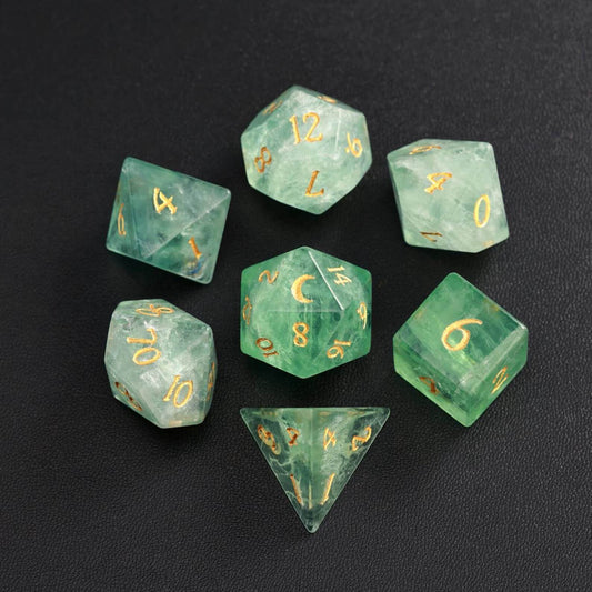 The sharp edge D&D dice rolling on a campaign map or dice rolling mat during Dungeons & Dragons gameplay.