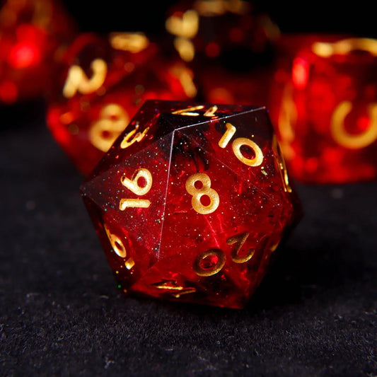 Close-up of the crisp, sharp edges and mirror polish on a fiery red resin D20.