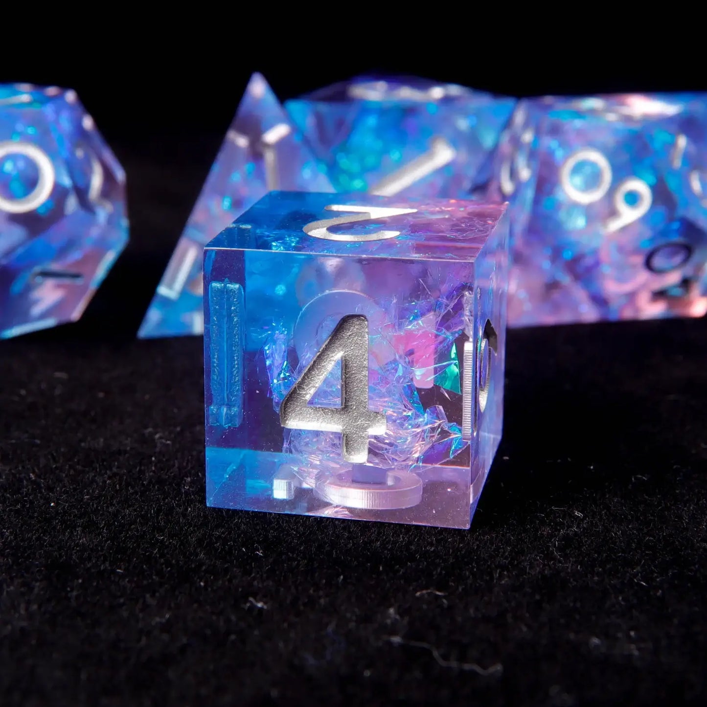 Detailed shimmer flakes inside URdice Light Purple & Blue Resin DND Dice