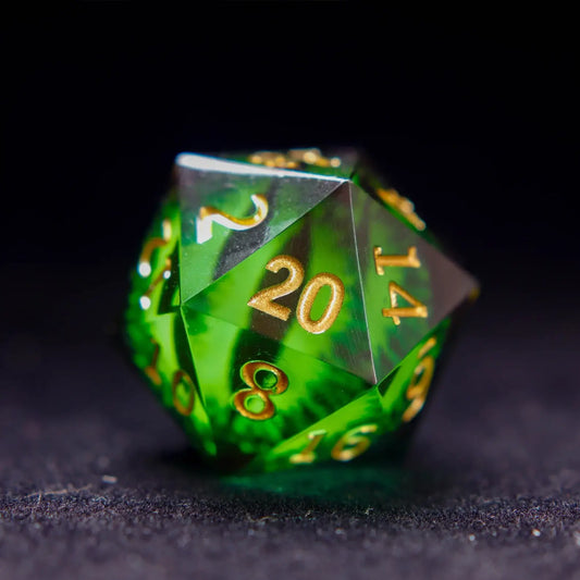 Close-up of a single Green Resin D20 die featuring the detailed static Demon's Eye design.