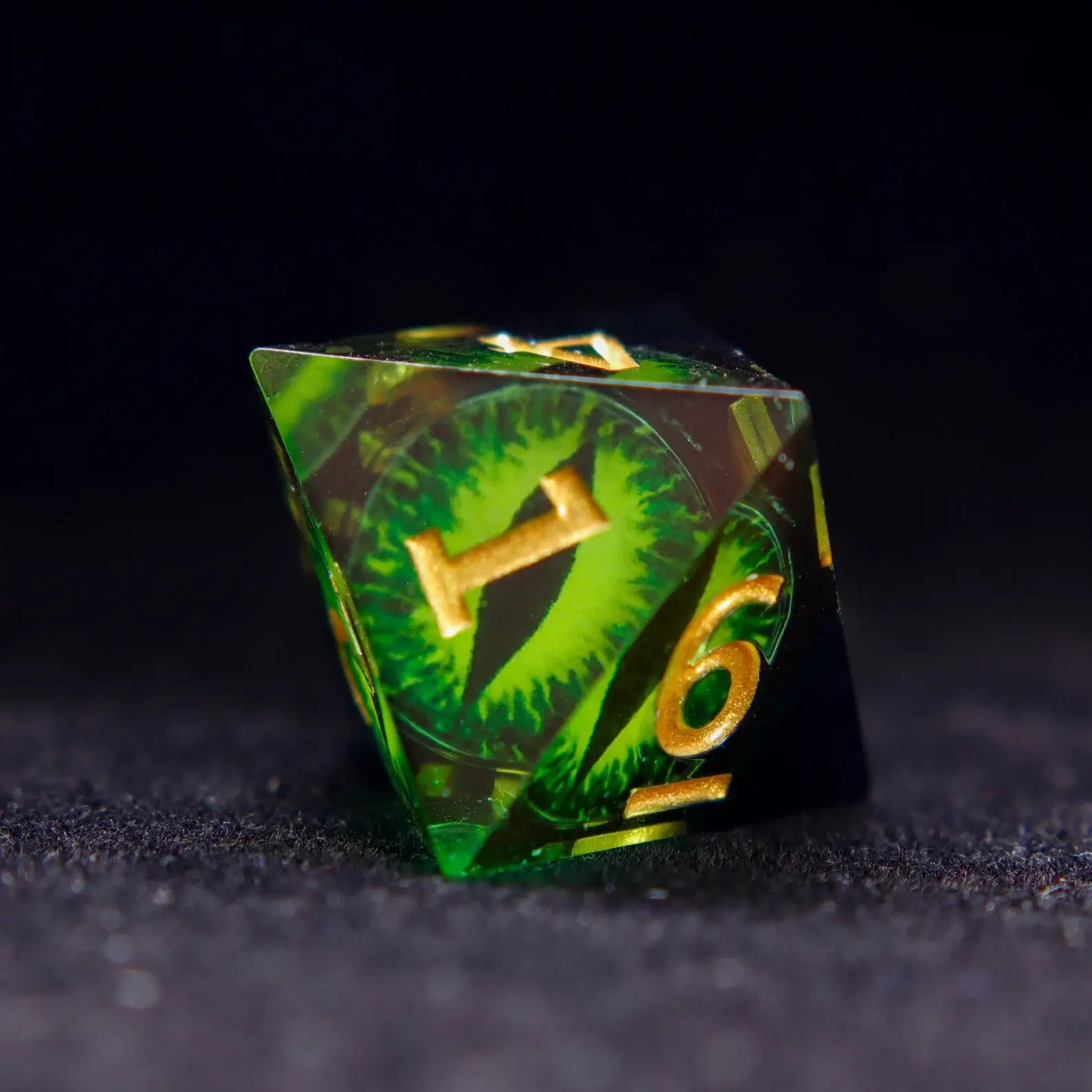 Single Green Resin D8 die showing the Demon's Eye design on multiple facets.