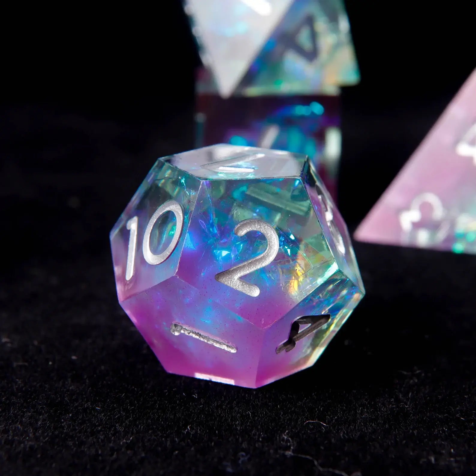 Detailed view highlighting the razor-sharp edges and polished faces of the holographic DND dice.

