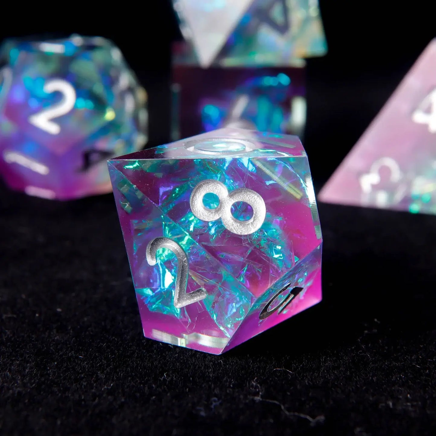  Detailed shot highlighting the sharp edges and holographic foil inside a die from the polyhedral set.
