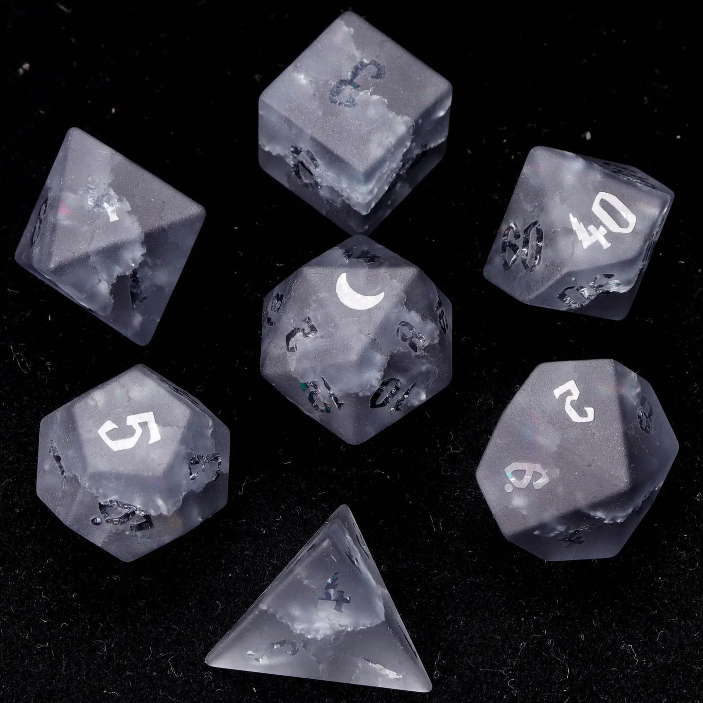 Complete URdice Thunder Vein gemstone dice set, all seven polyhedral dice laid out on a black background.