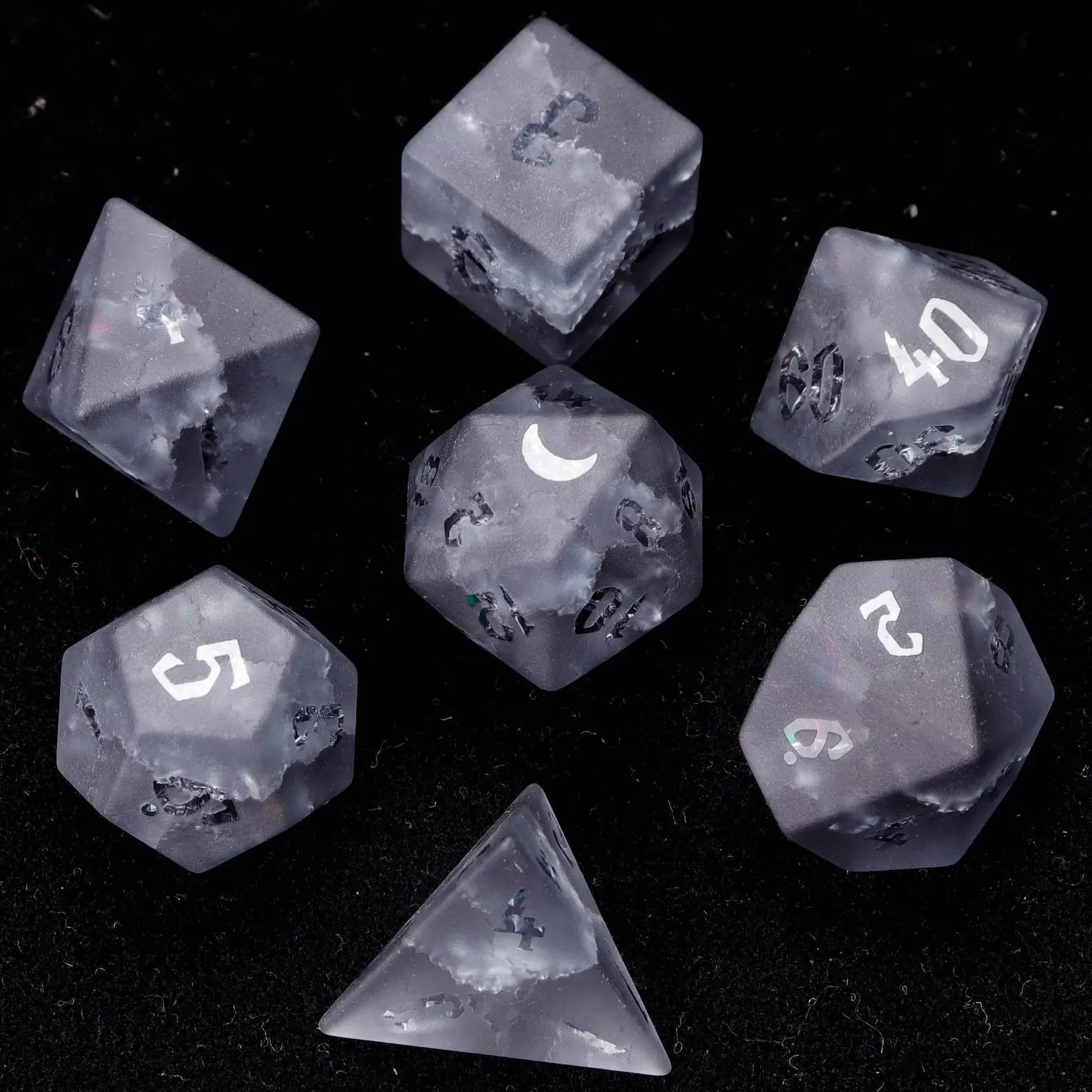 Complete URdice Thunder Vein gemstone dice set, all seven polyhedral dice laid out on a black background.