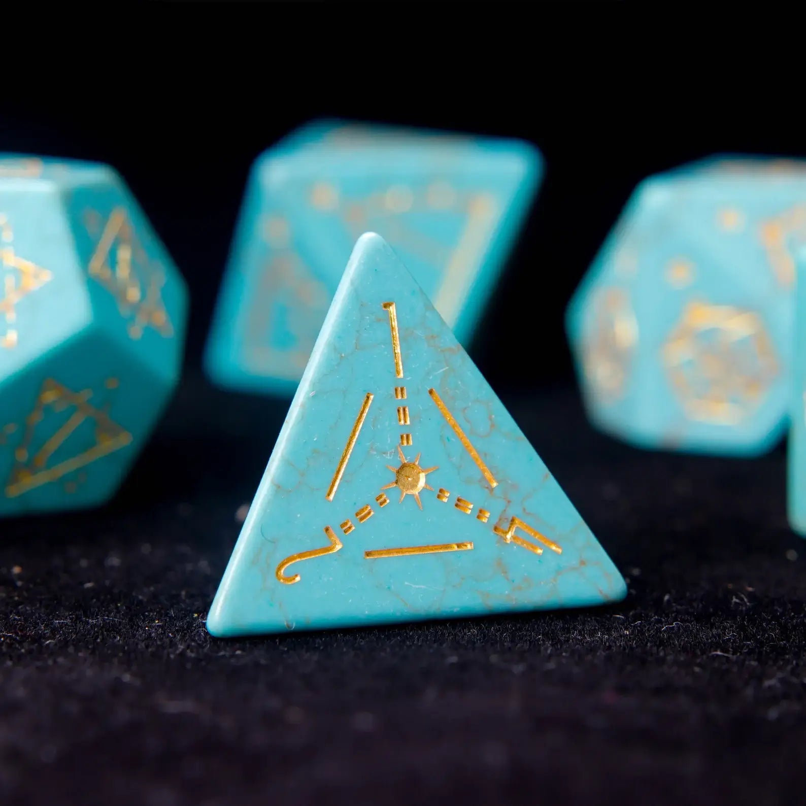 Single engraved Green Howlite D4 die (pyramid shape) standing upright.