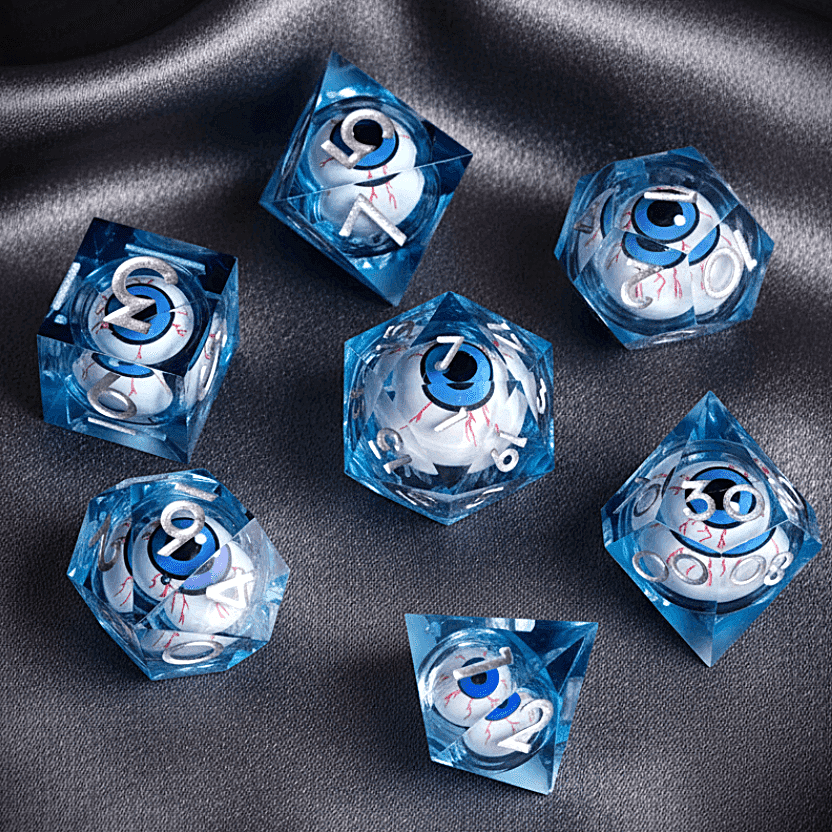 Complete set of seven blue URdice Moving Eyes D&D dice. Features a cool-toned blue resin body with glowing eyes suspended in the liquid core.