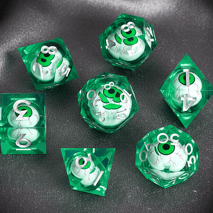 Deep green URdice Moving Eyes D&D dice full set. The classic color highlights the hypnotic gaze of the eyes inside the liquid cores.