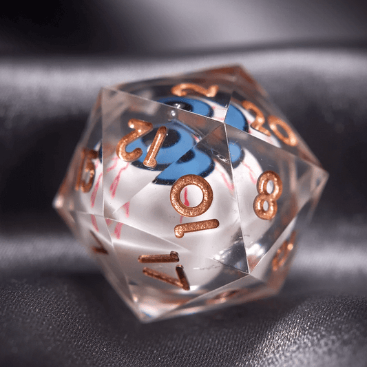 Close-up of a white D20 die from the Moving Eyes set. A mysterious eye floats within its glowing green liquid core.