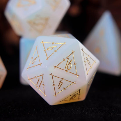 White carved opal D20 featuring frost-like opal shimmer and deep engraved numerals.